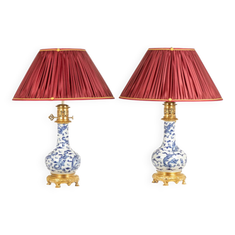 Pair of porcelain lamps decorated with dragons and gilded bronze, circa 1880.