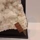 White quartz block on base