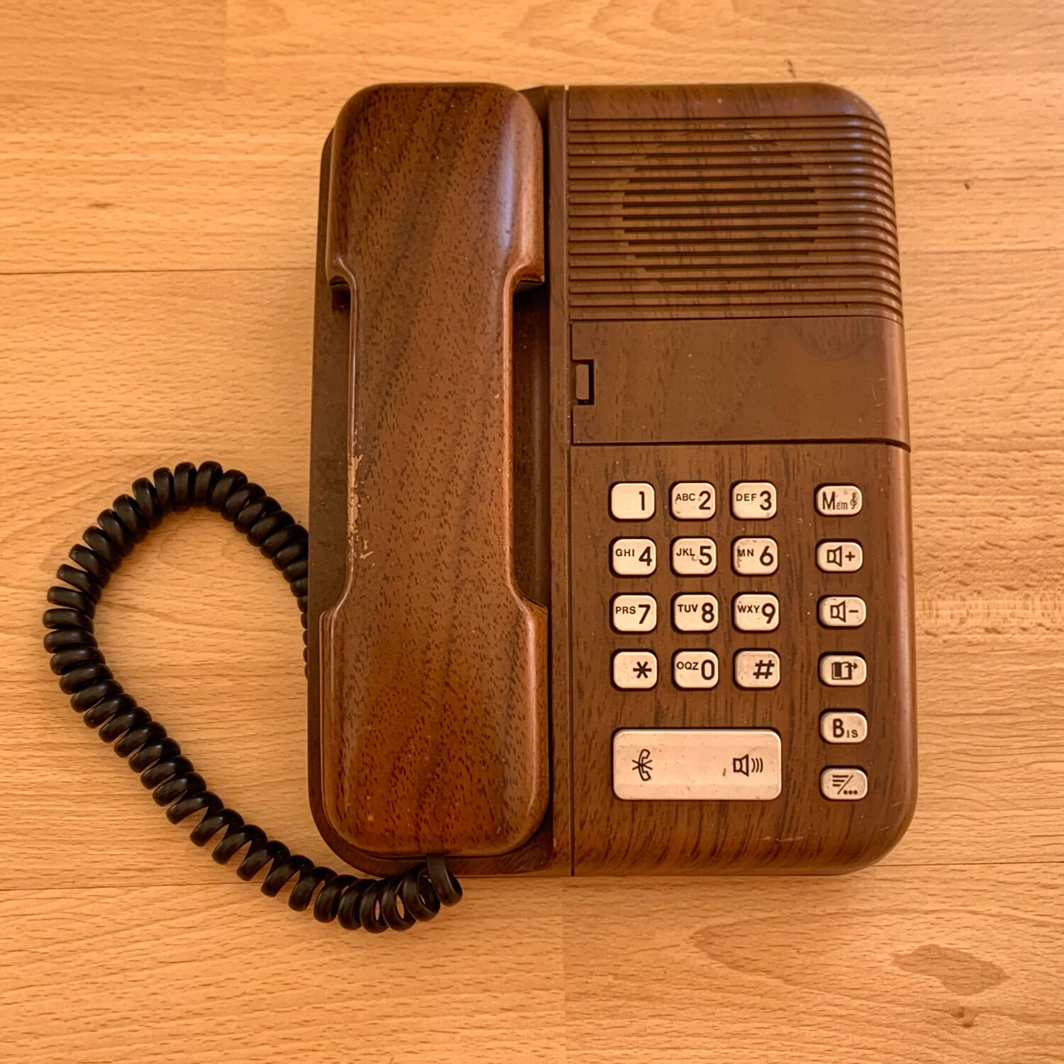 Old Thomson bakelite telephone and vintage wood