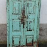Old wooden cabinet with beautiful green patina