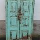 Old wooden cabinet with beautiful green patina