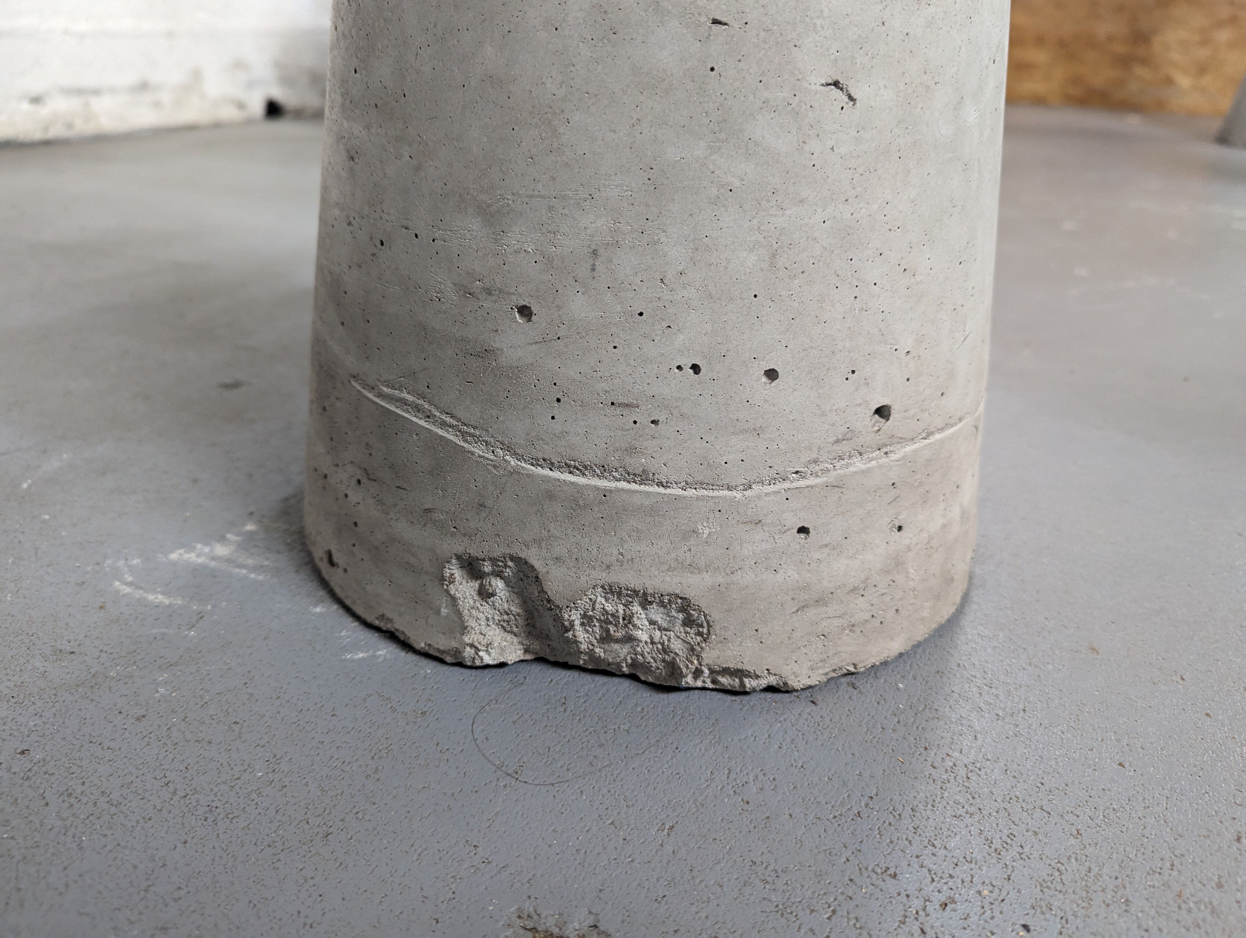 Glass table with cement legs