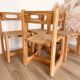 Ensemble de 4 chaises en bois et cannage - années 1960-70