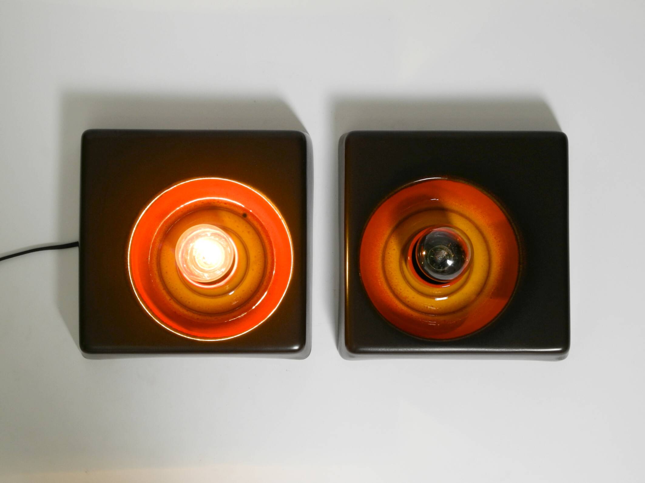 Two beautiful original 1970s Space Age ceramic wall lamps