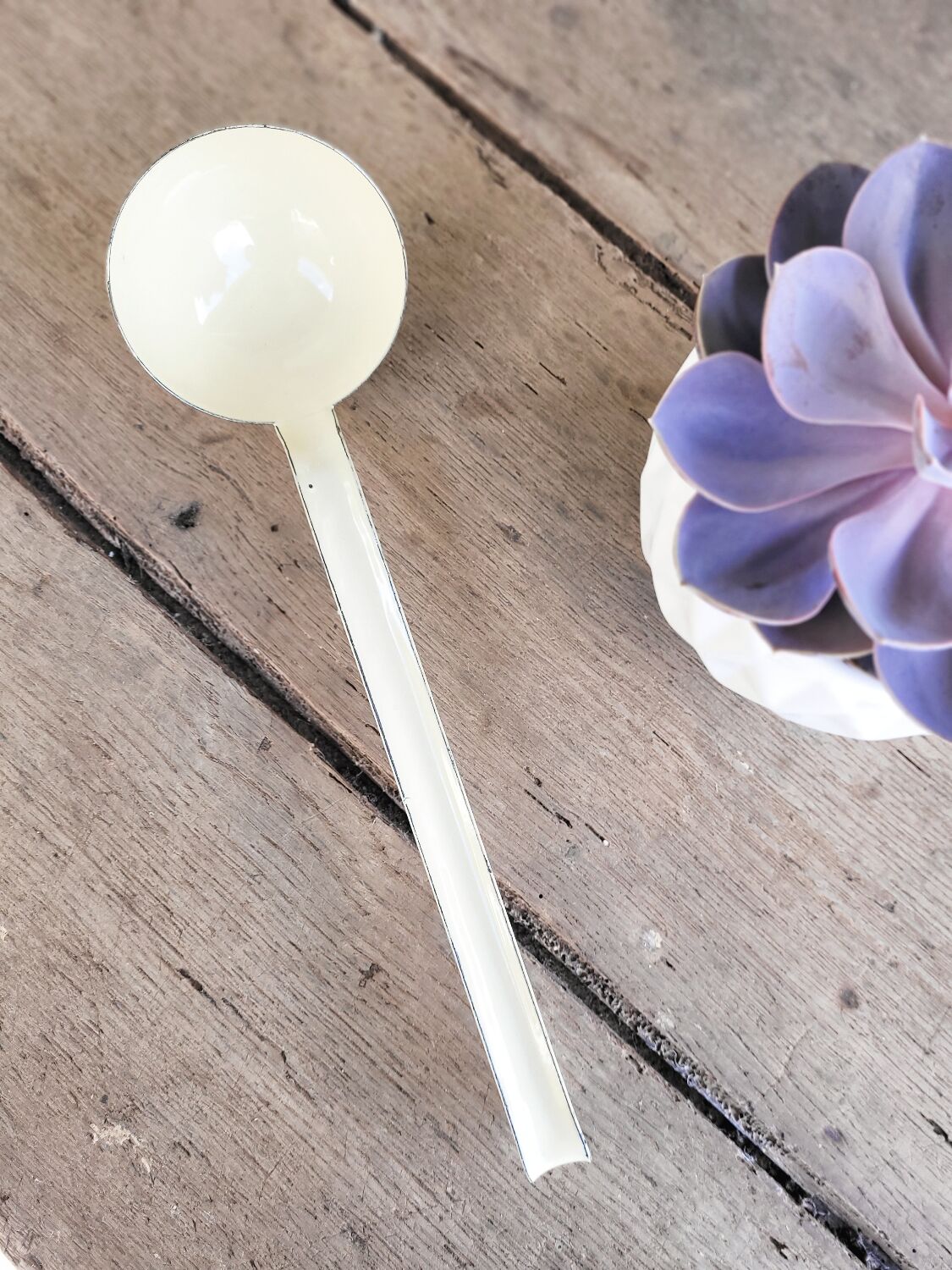 cream enamelled ladle