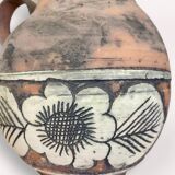Handcrafted pottery pitcher from the 50s