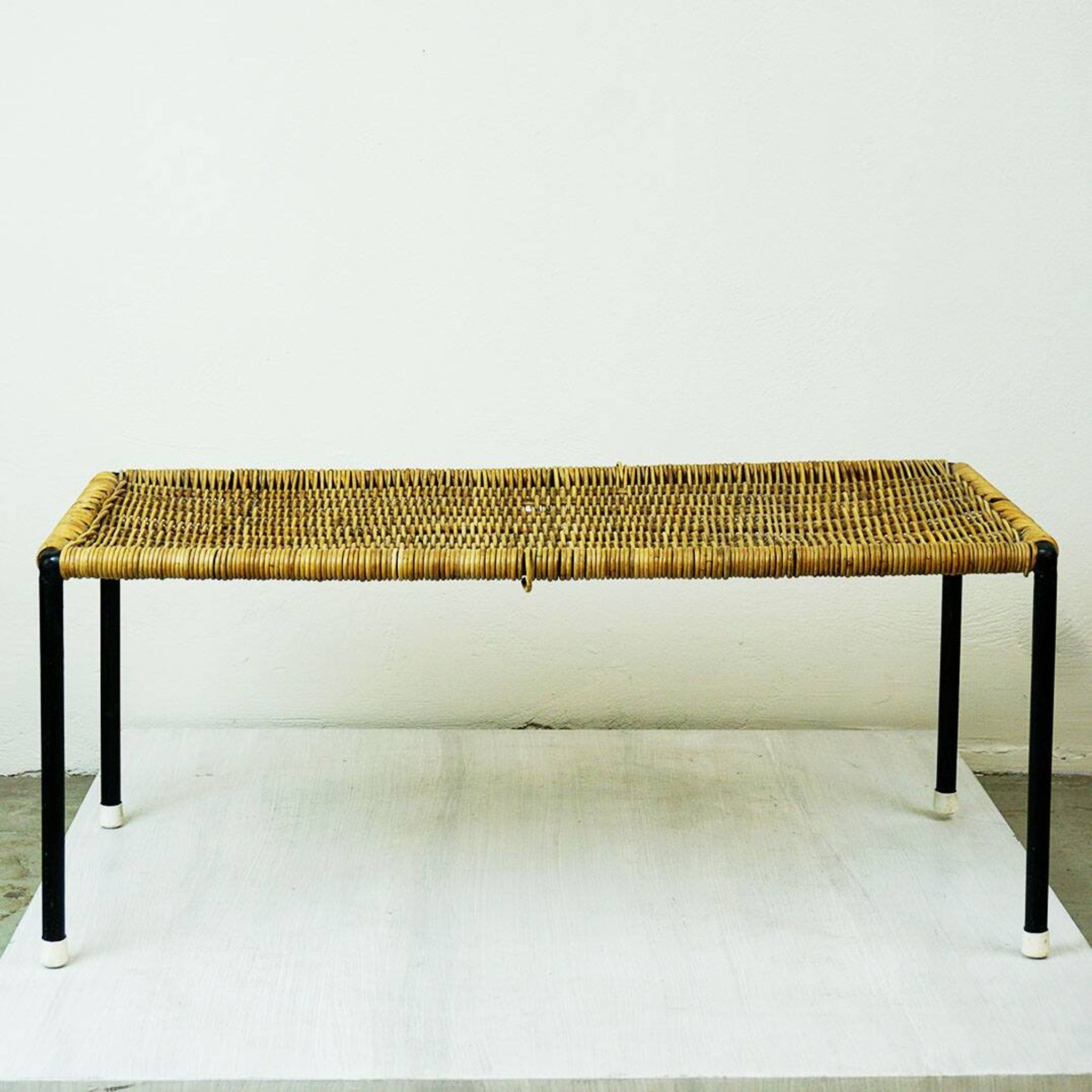 Black steel and wicker side table by Carl Auböck, mid-century.