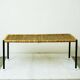 Black steel and wicker side table by Carl Auböck, mid-century.