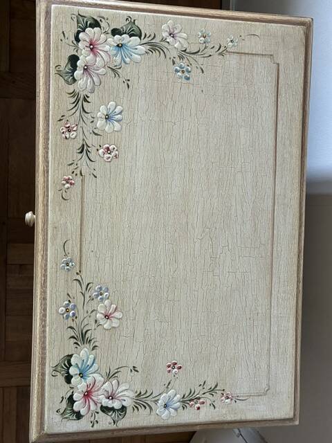 exotic wood console with a drawer
