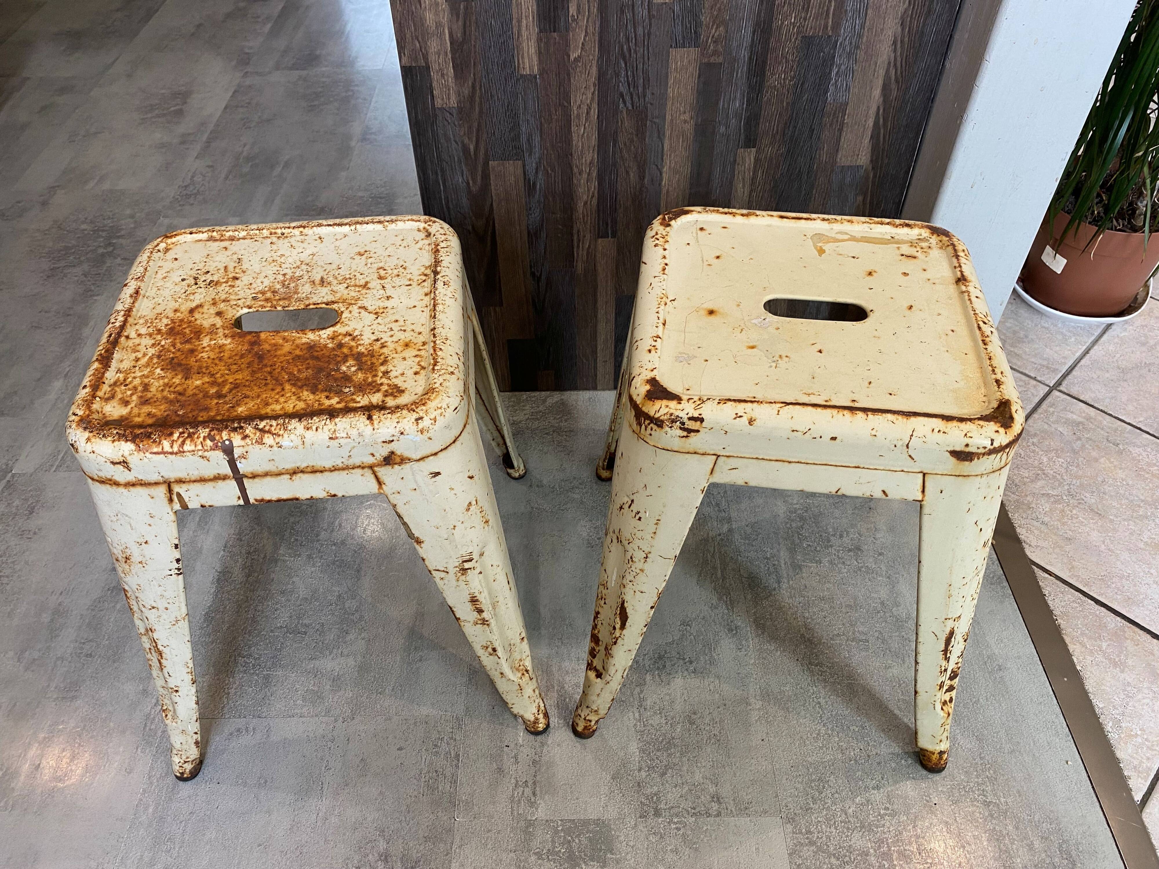 Authentic pair of Xavier Pauchard industrial Tolix metal stools 50