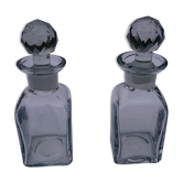 Pair of art deco moulded glass bottles
