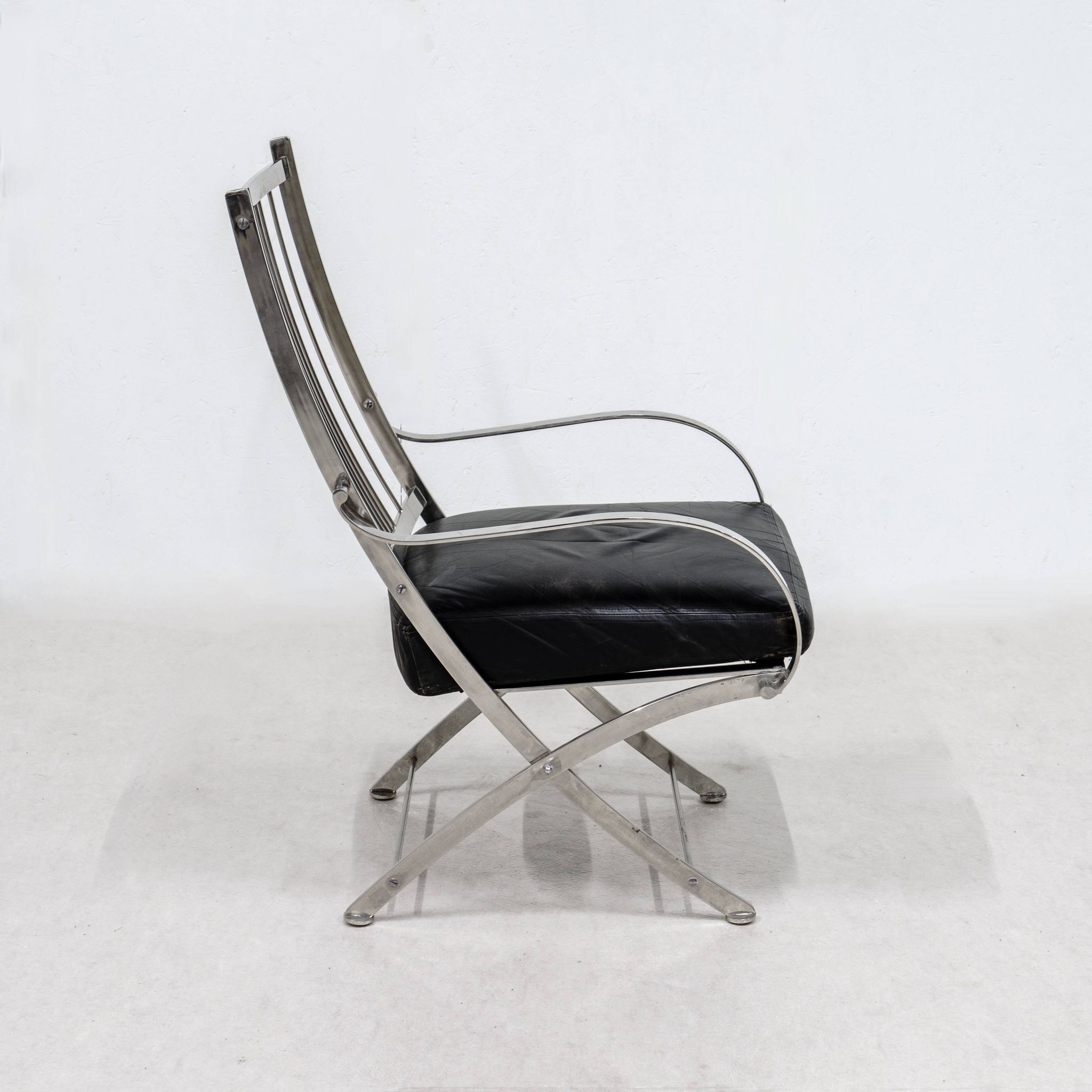 Henri Pouenat fauteuil et ottoman "Schneider "