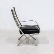 Henri Pouenat fauteuil et ottoman "Schneider "
