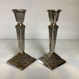 Pair of ornate silver candlesticks