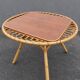 "Trampoline" round coffee table in 1960s rattan