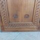 Corner cabinet in carved walnut, Savoyard style.