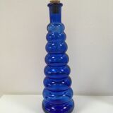 Lot of 2 soliflore vases in twisted blue glass