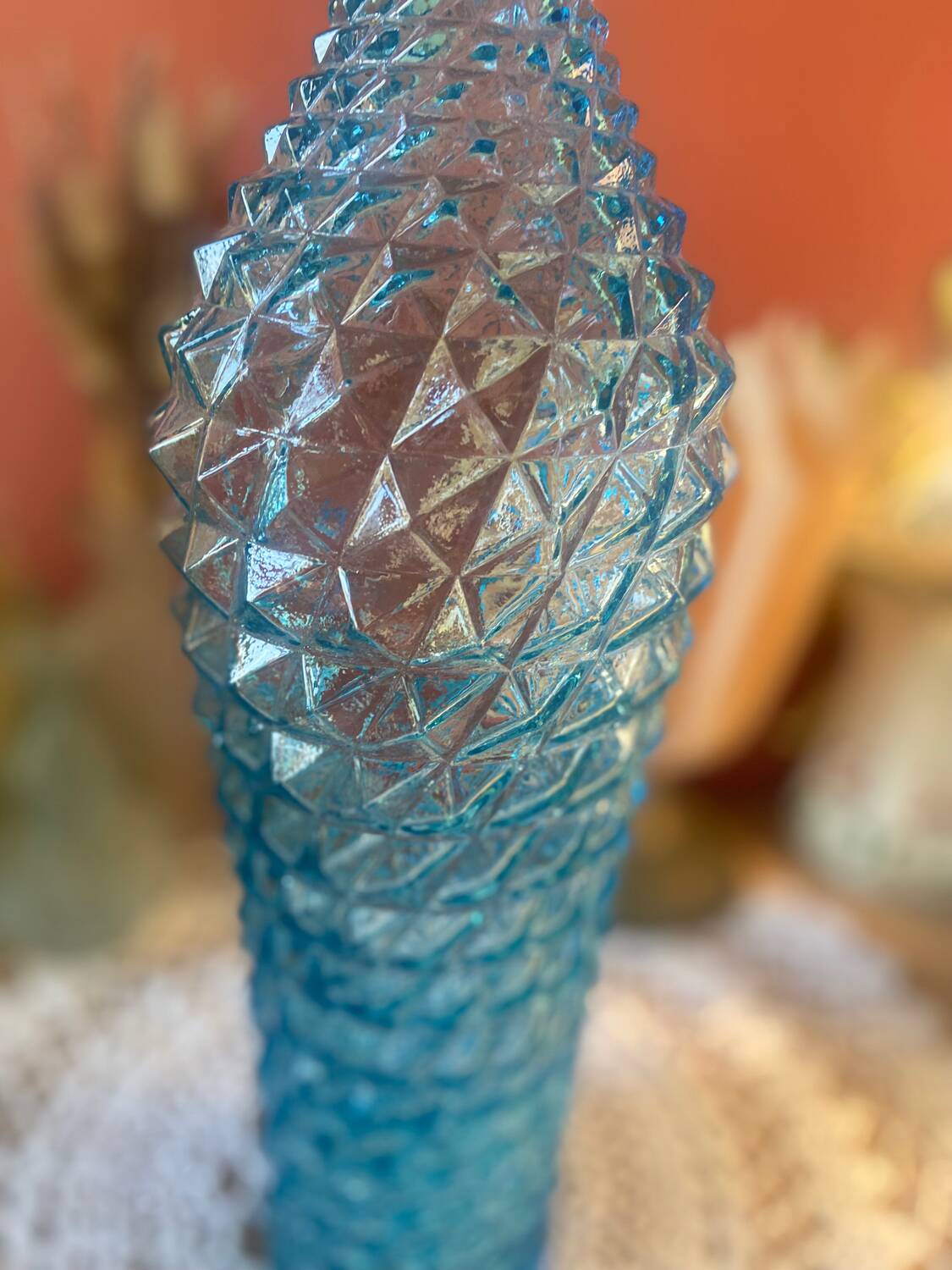 Large turquoise bottle