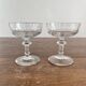2 antique 19th-century blown glass champagne coupes with flat sides