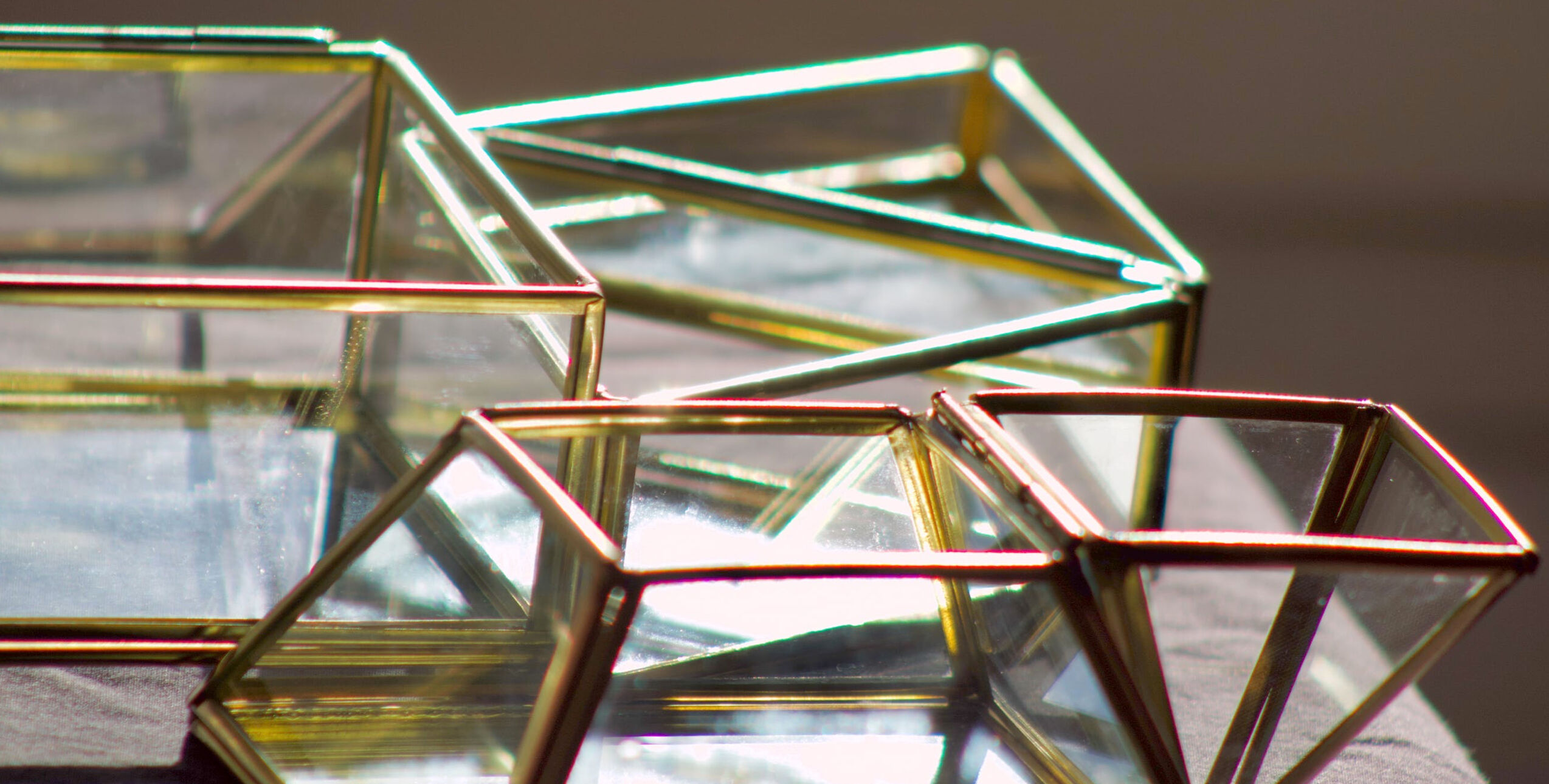 4 old glass, brass and mirror jewellery boxes