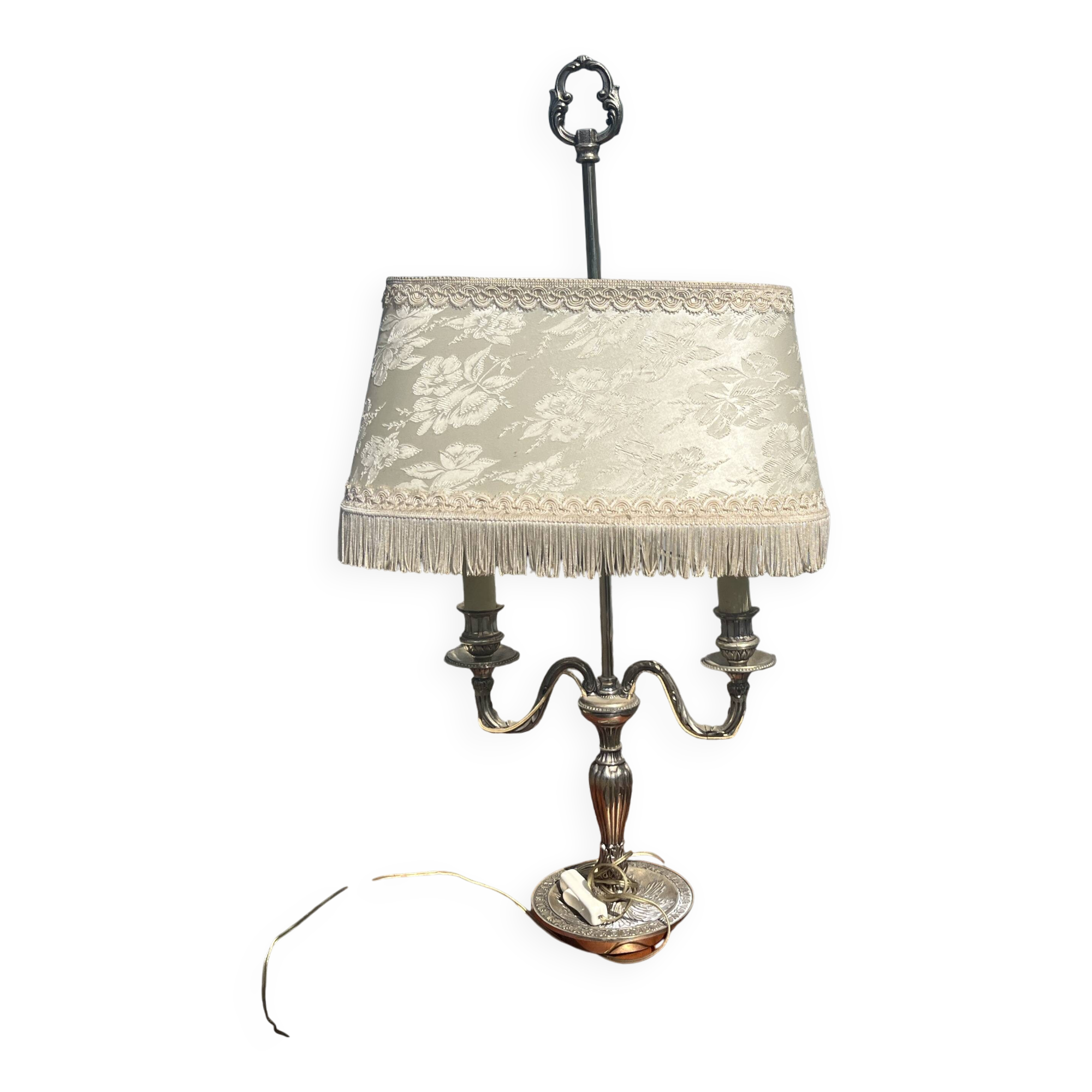 Two-armed hot water bottle lamp in silver metal with fringed fabric shade