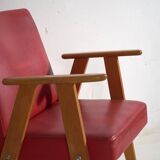 2 red armchairs, circa 1960