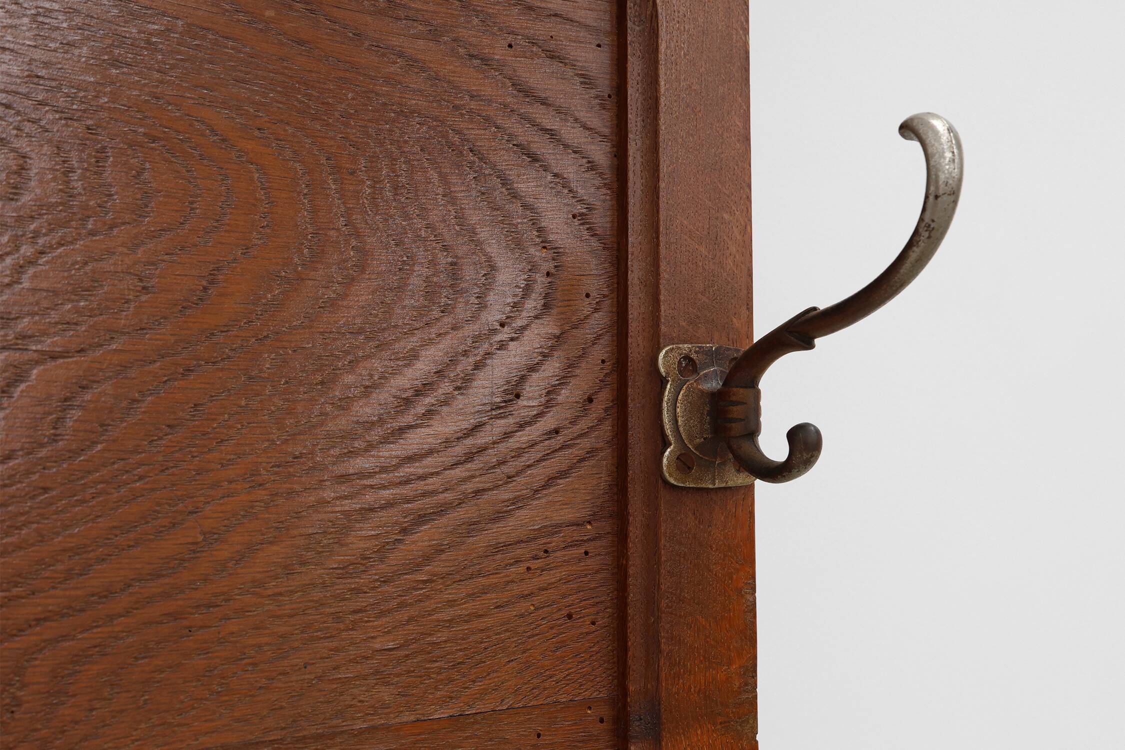 Art Deco oak carved wall coatrack with mirror, France 1920s