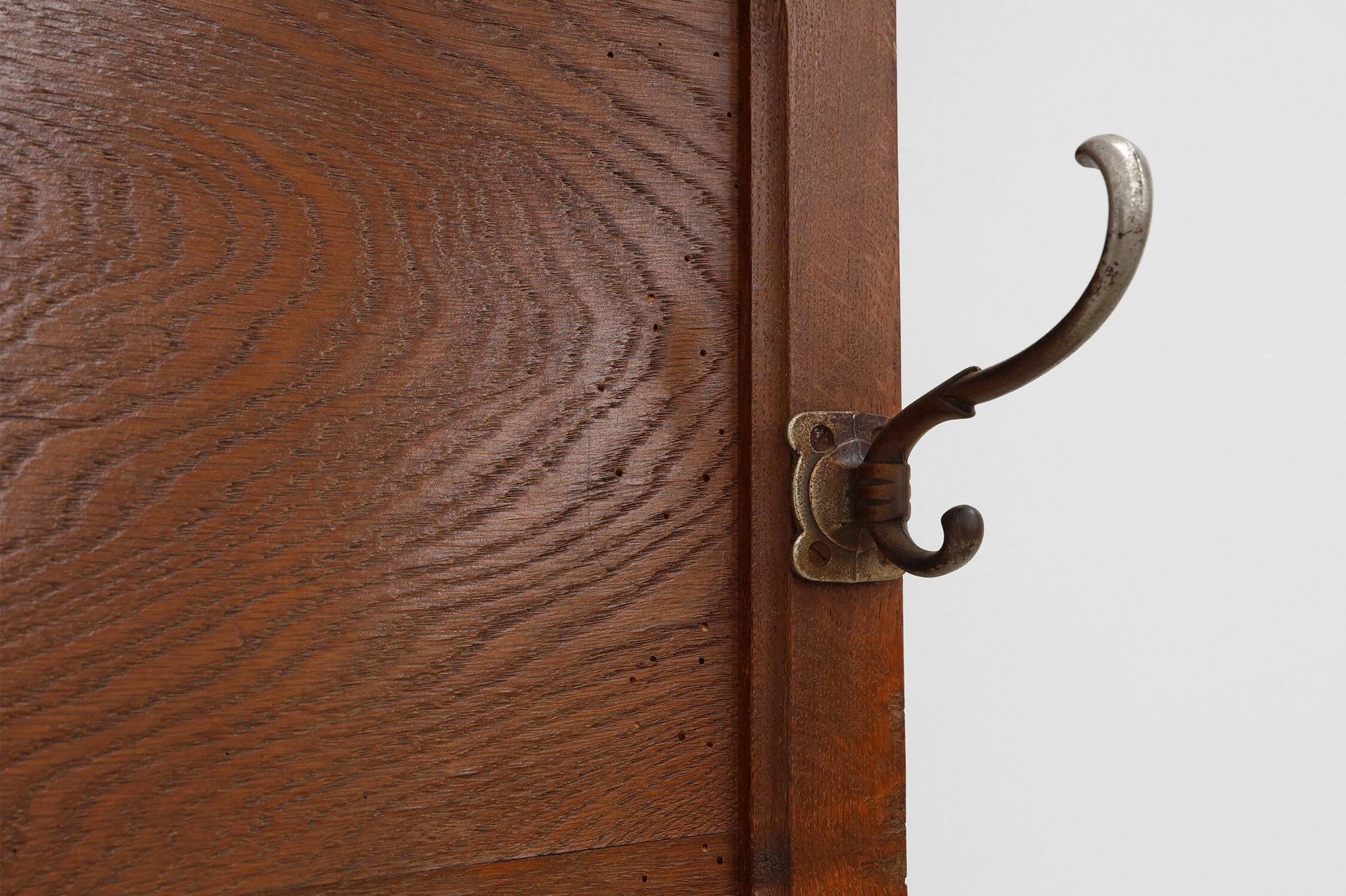 Art Deco oak carved wall coatrack with mirror, France 1920s