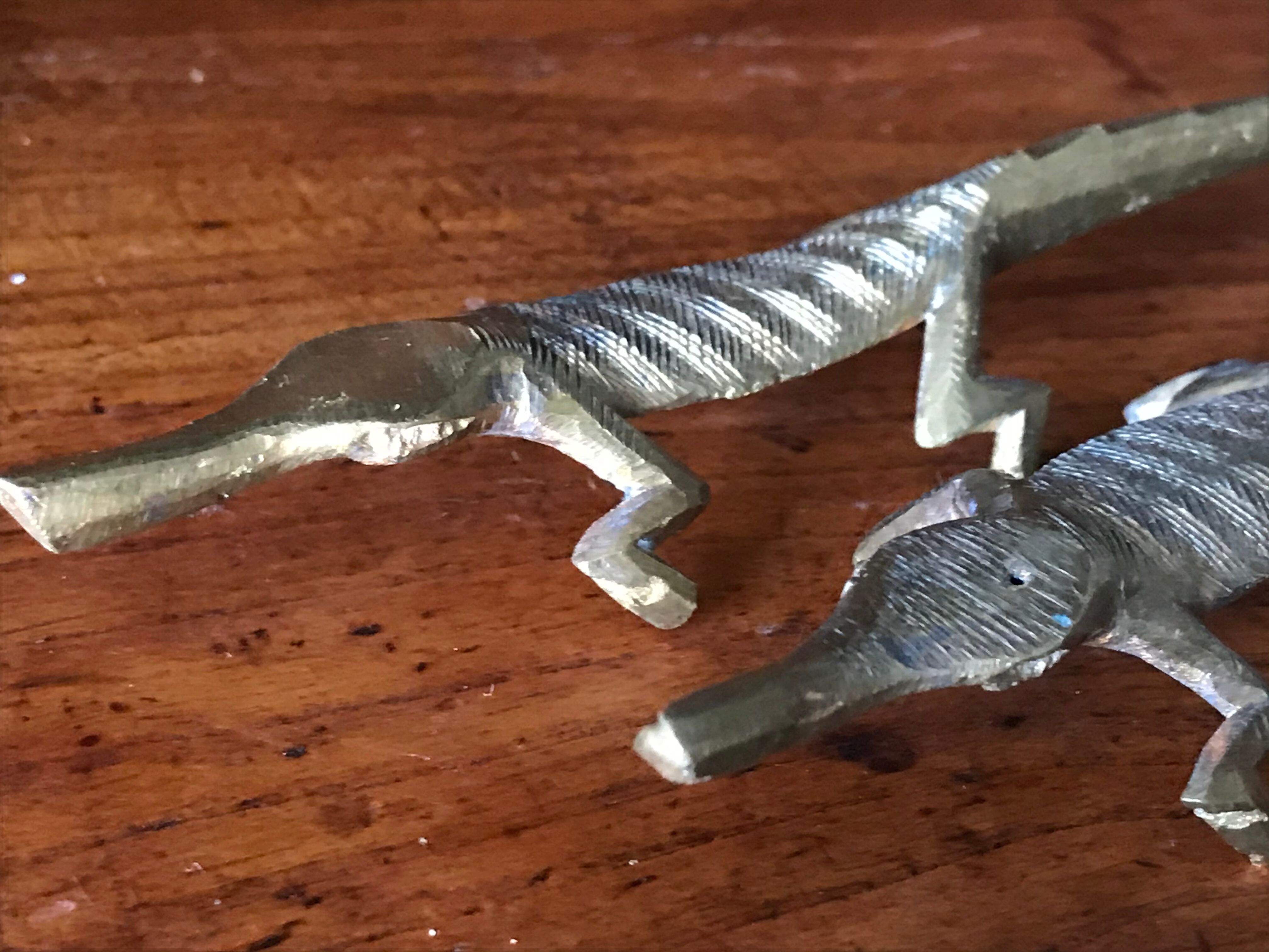 Couple of brass alligators