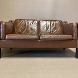 Scandinavian design 2-seater leather sofa.