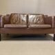 Scandinavian design 2-seater leather sofa.