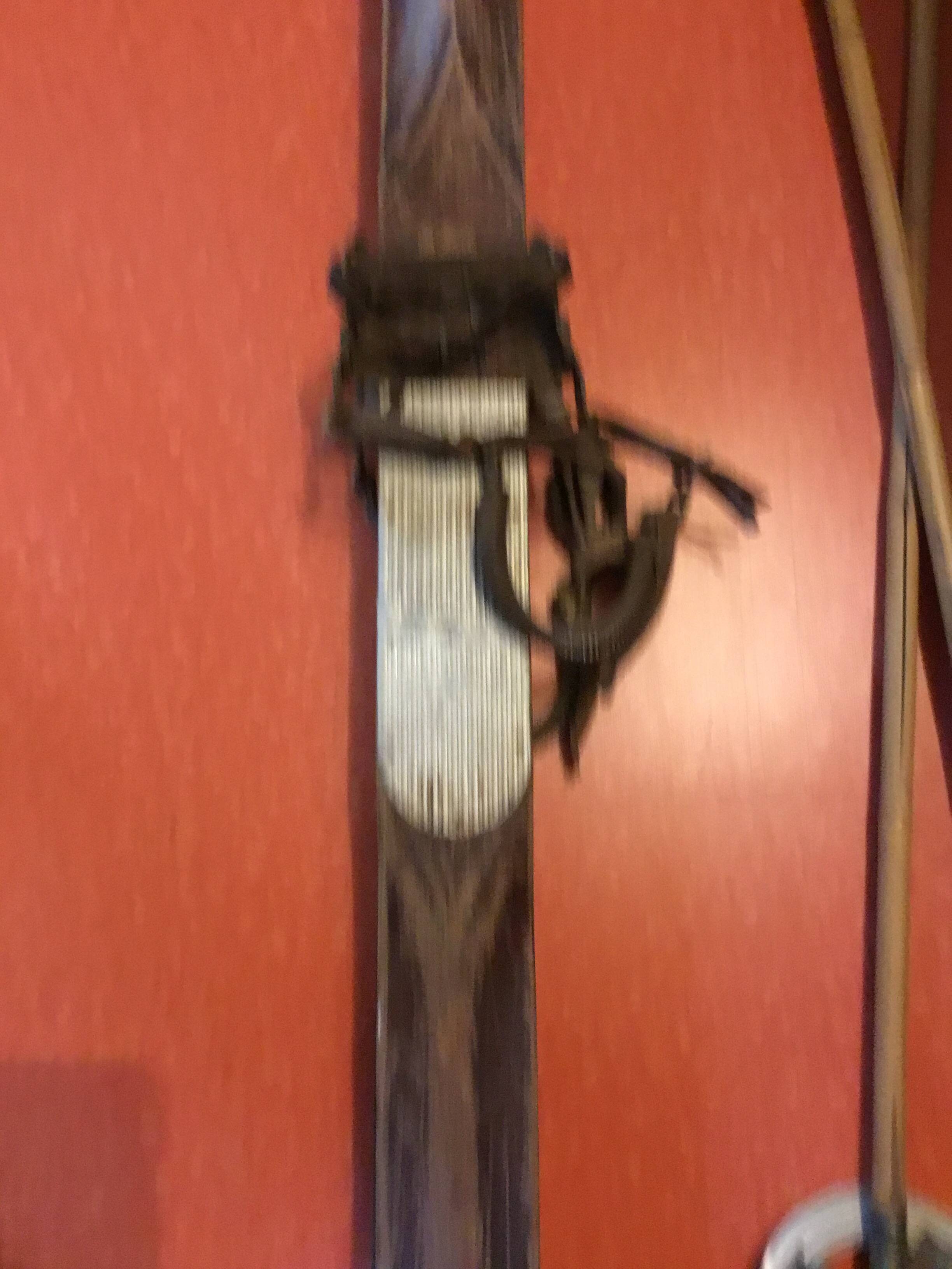 Pair of old skis and poles