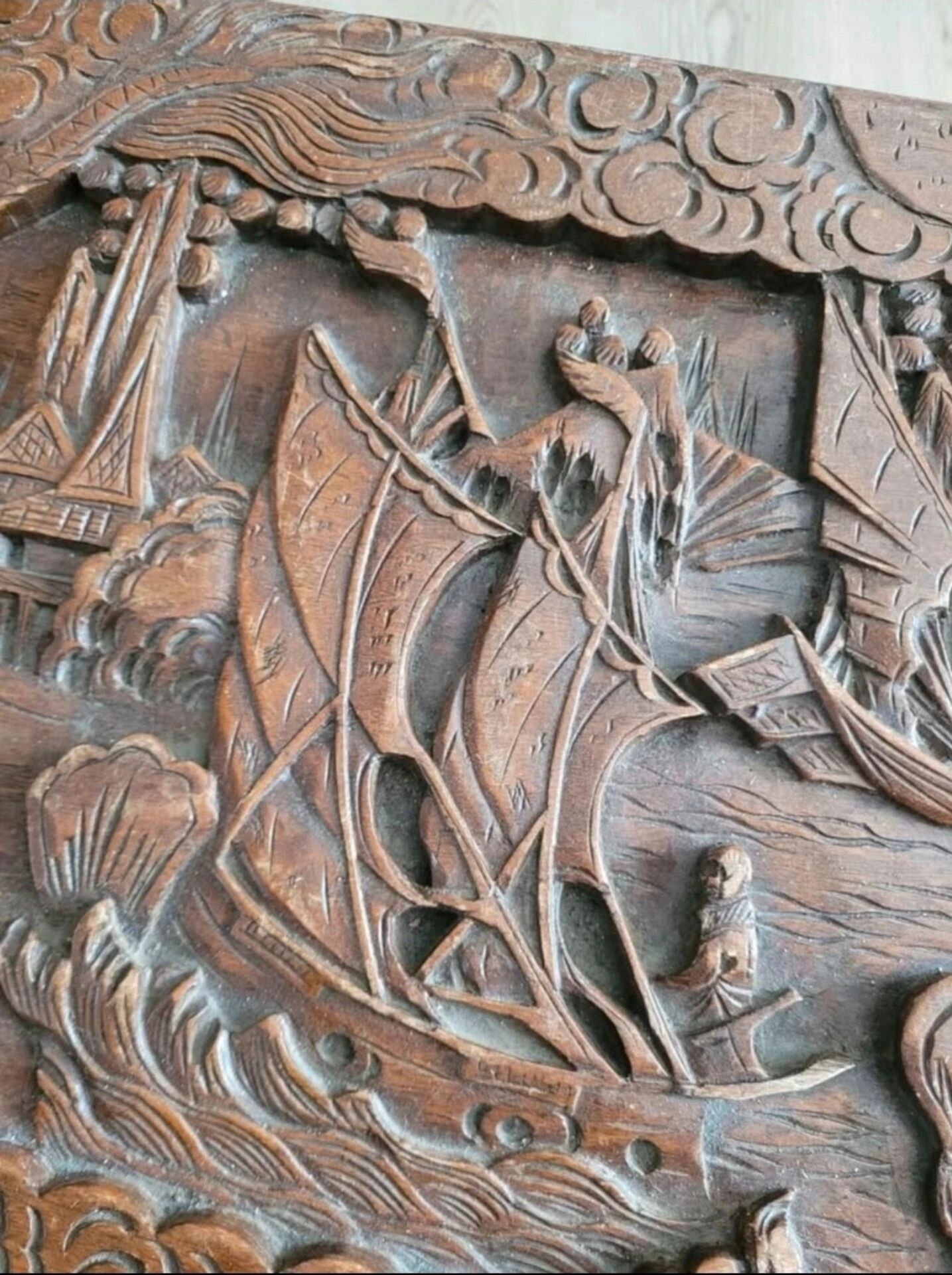 Carved chest in Asian camphor wood, chinoiserie boat decoration.