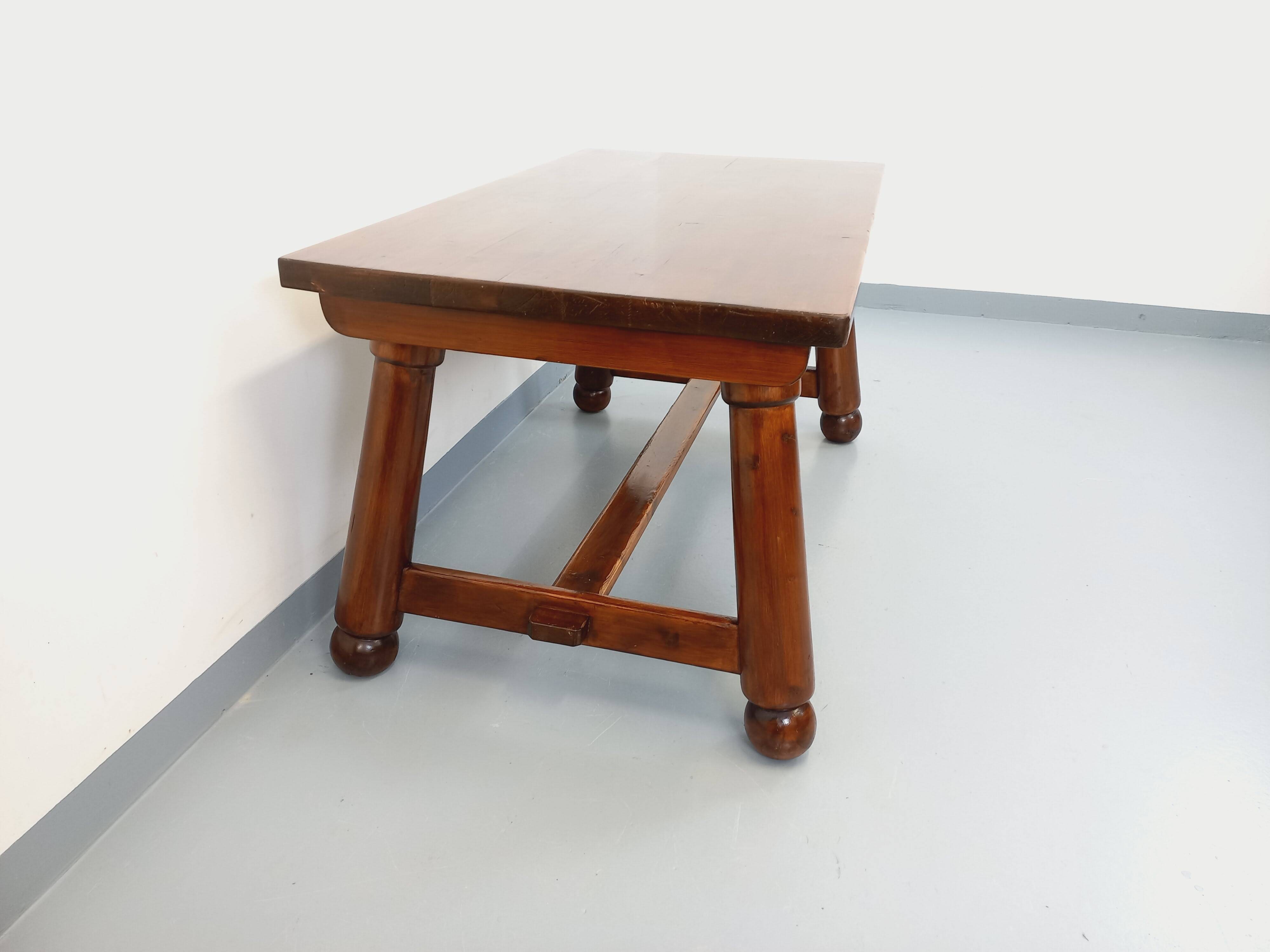 Brutalist rectangular dining table by Georges Robert in pine wood.