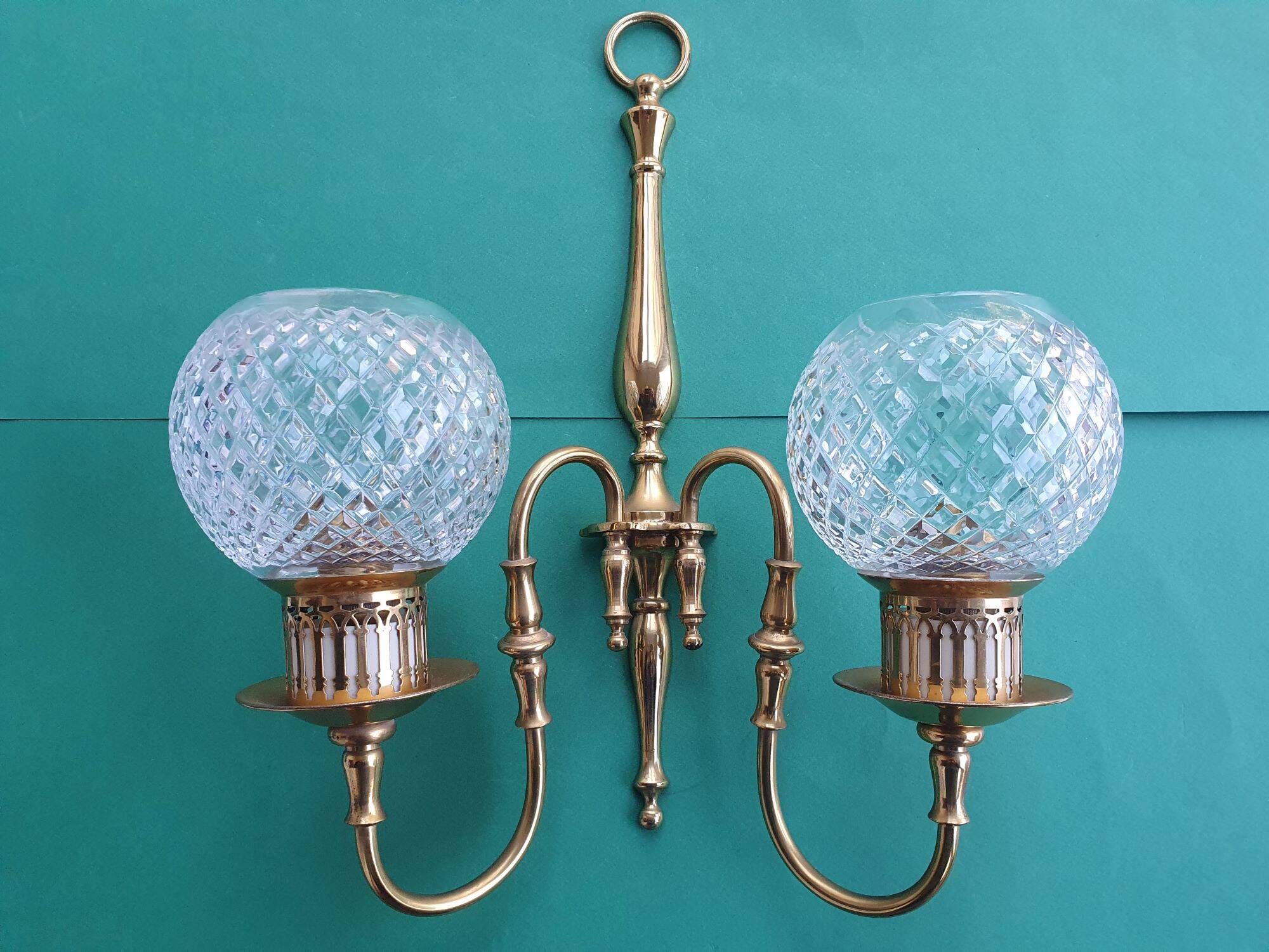 Two-light wall light gold with antique crystal globes