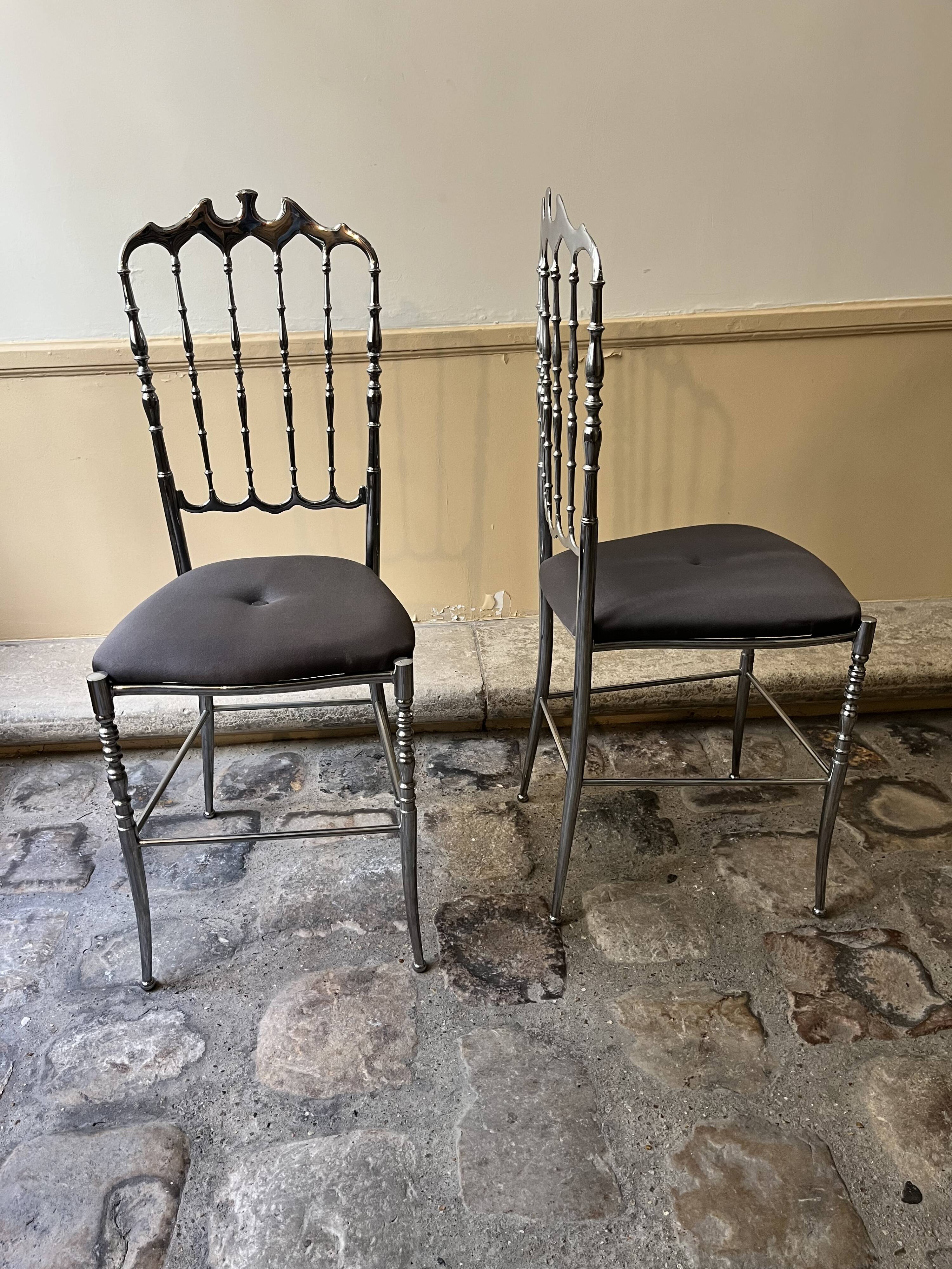 Pair of Chiavari chairs in polished mirror aluminium.