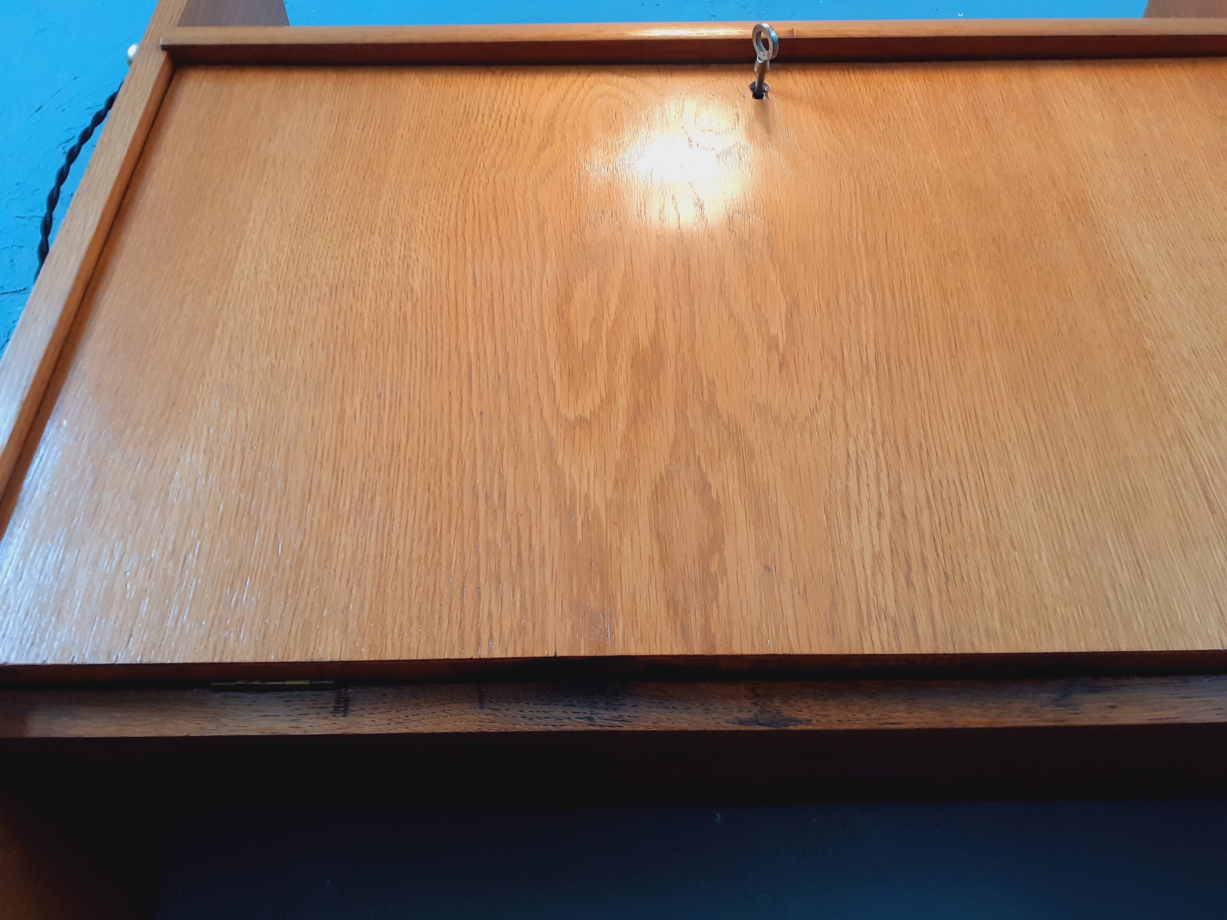 Wall-mounted oak desk from the 1950s.