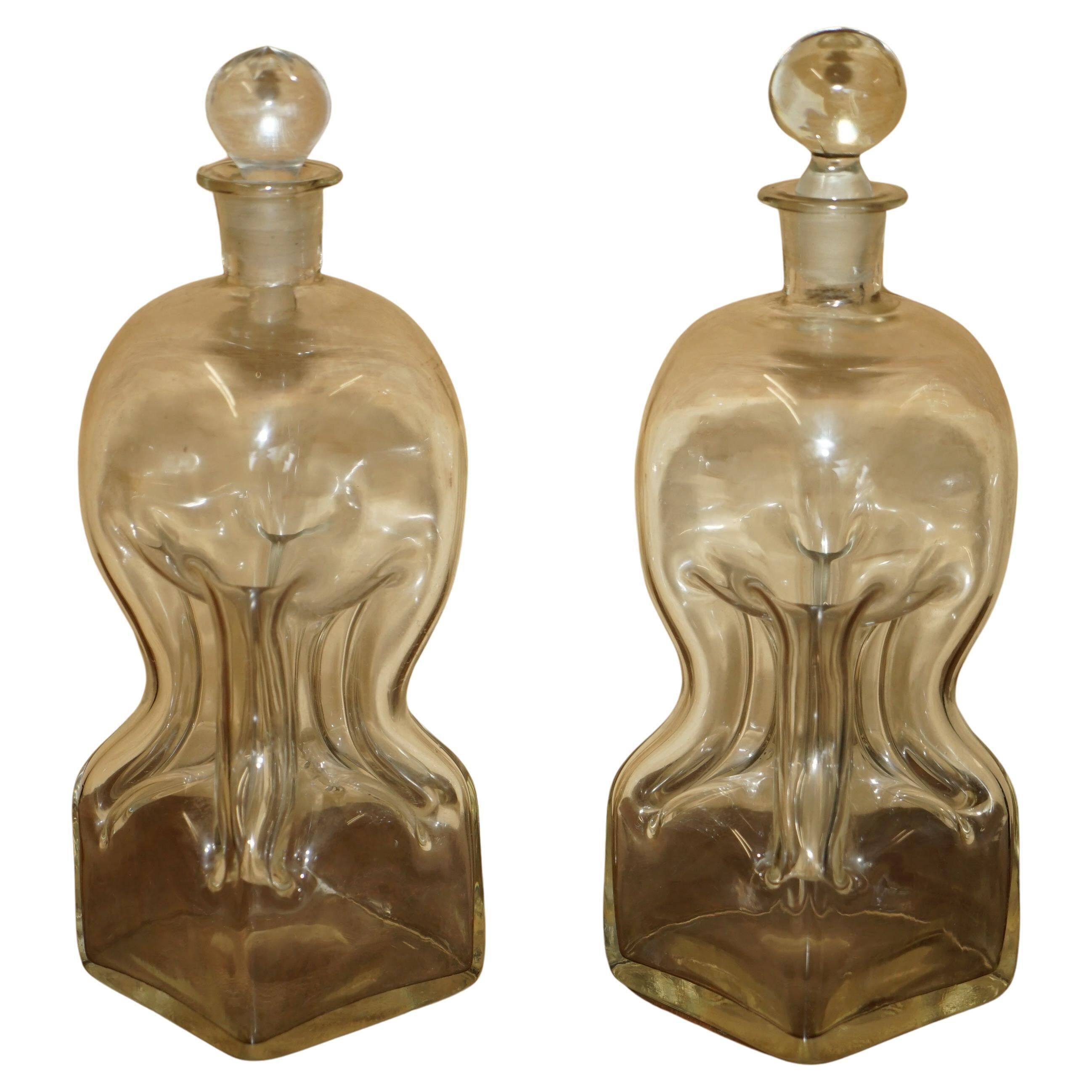 Pair of antique pinched decanters circa 1900 for serving whisky, bourbon, vodka, gin.