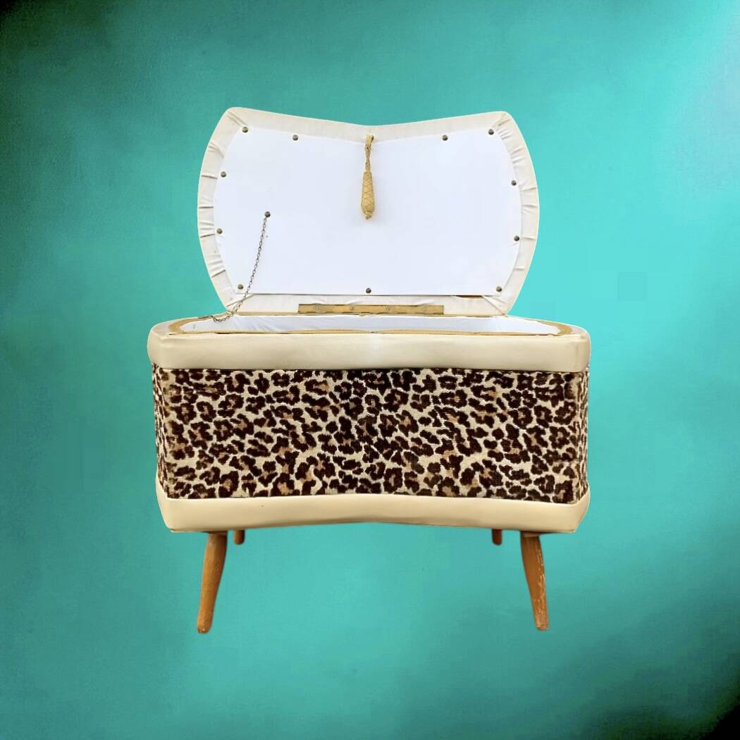 Vintage storage stool with compass legs in white faux leather and leopard velvet.