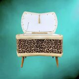Vintage storage stool with compass legs in white faux leather and leopard velvet.