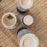 Set of 4 signed enameled vases