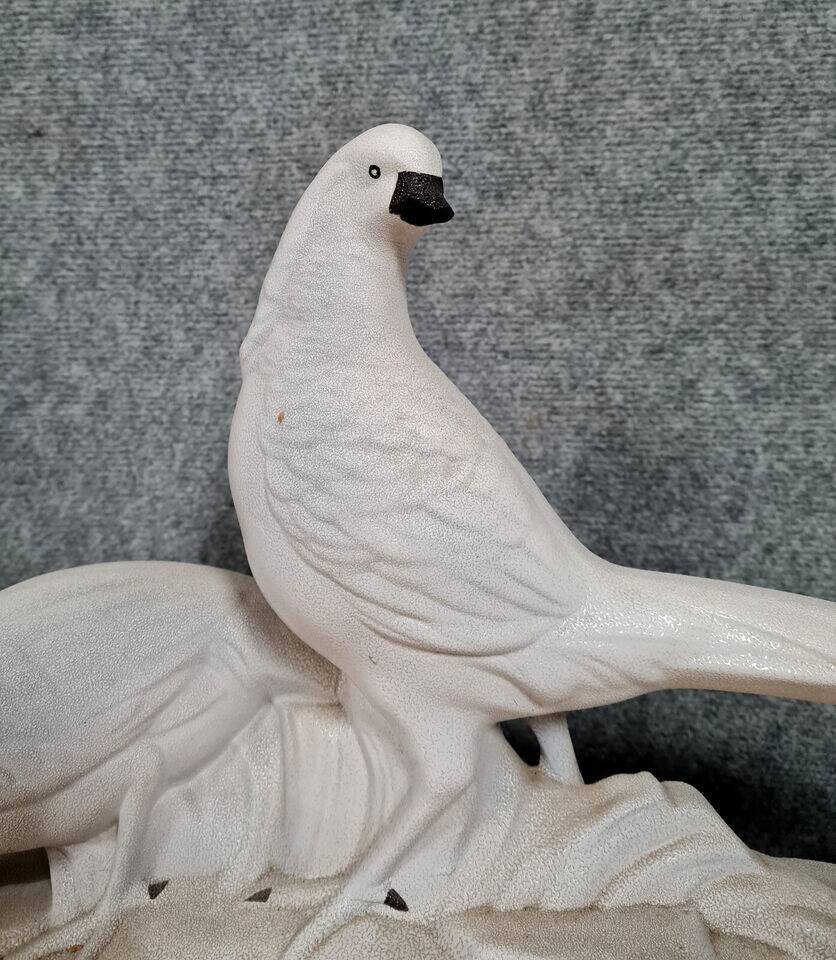 Pair of golden pheasants in crisp porcelain, Art Deco period