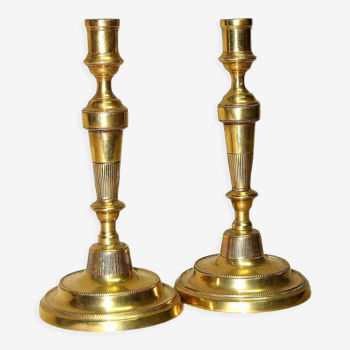 Pair of eighteenth century brass candlesticks