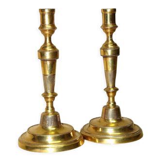 Pair of eighteenth century brass candlesticks