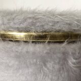 Vintage brass pouf with fur.