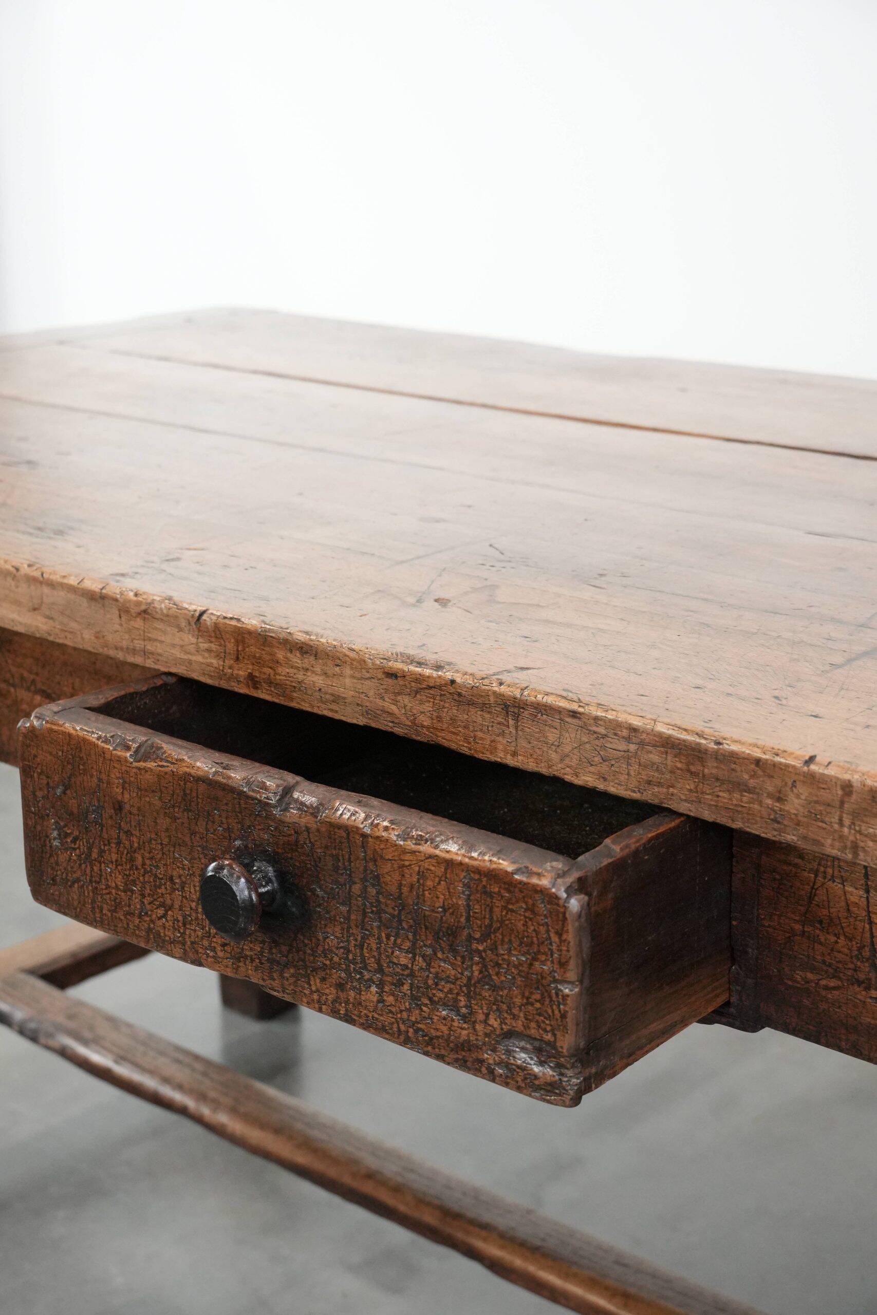 Robust French farmhouse antique dining table from the 18th century