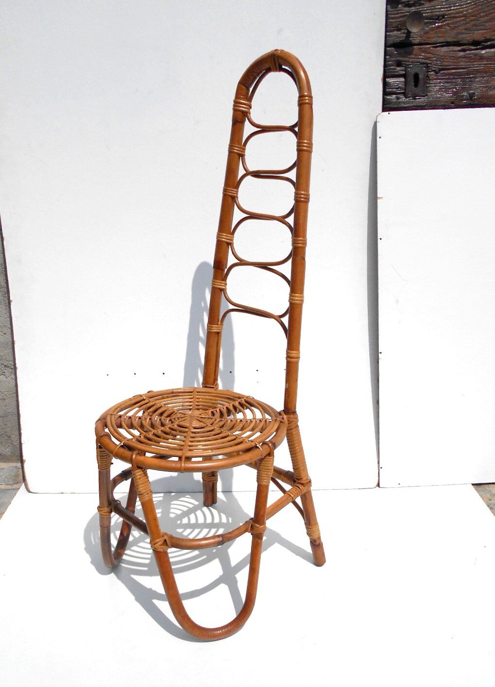 Two Dirk Van Sliedregt rattan chairs,1950s