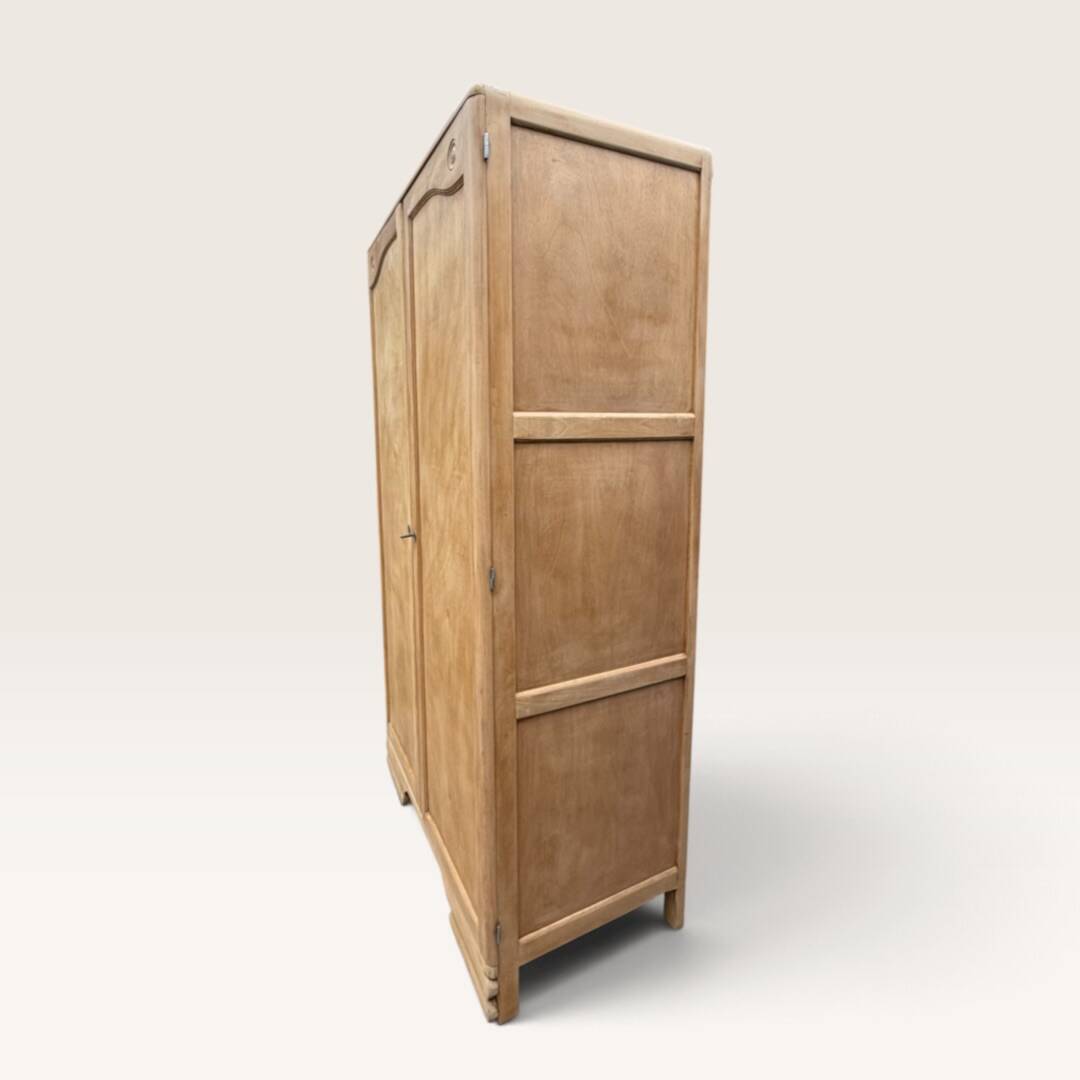 Parisian Art Deco wardrobe, renovated with raw wood.