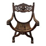 Curule Dagobert armchair in walnut