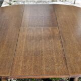 Round wooden table with 1 integrated extension + 6 wooden and fabric chairs
